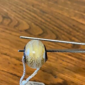 Persona Sparkly Gold with White Swirls Bead